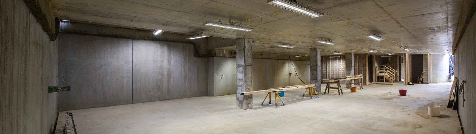 Completed concrete basement structure before fitout, with clear spans and finished slab