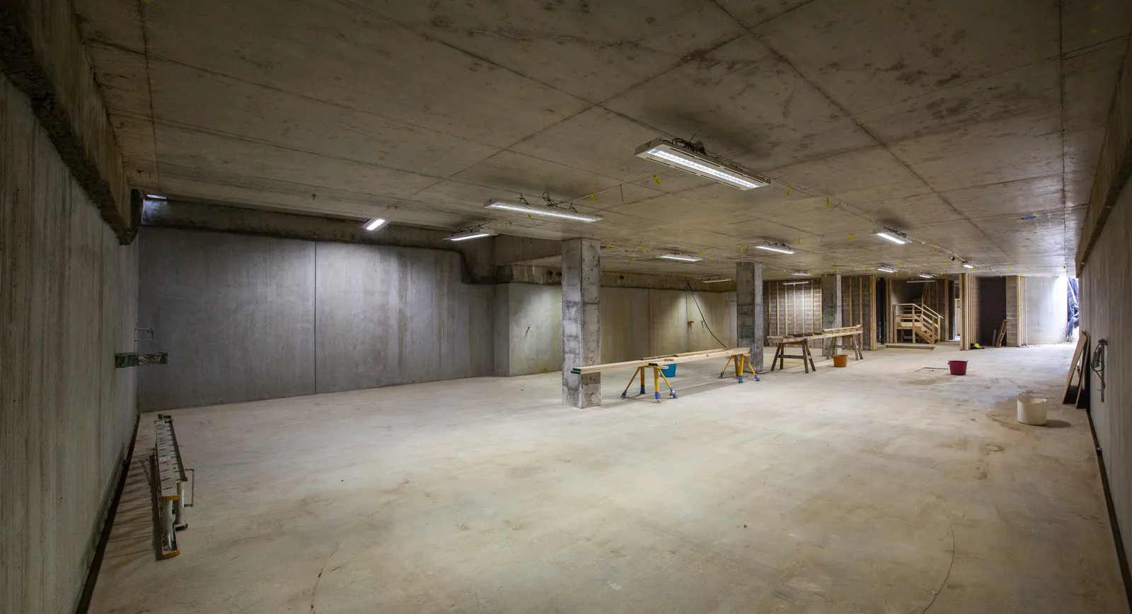 Completed concrete basement structure before fitout, with clear spans and finished slab