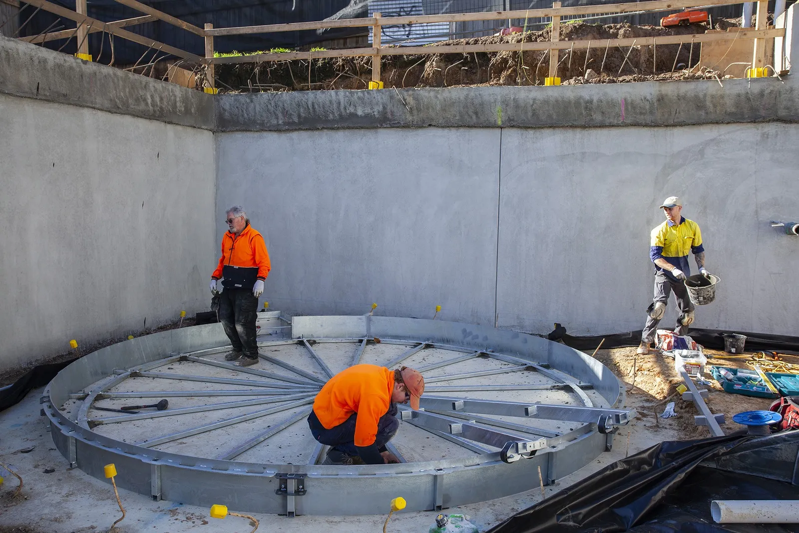 Car turntable being installed in a residential basement
