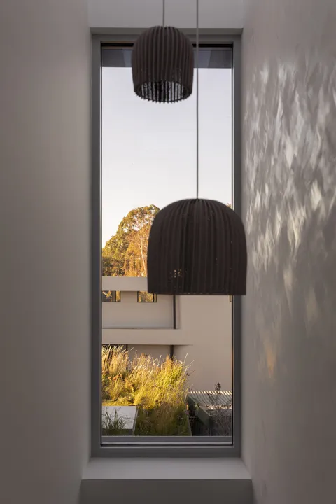 Joy Terrace, South Yarra, screen facade and ornamental grasses, heritage renovation by TCON