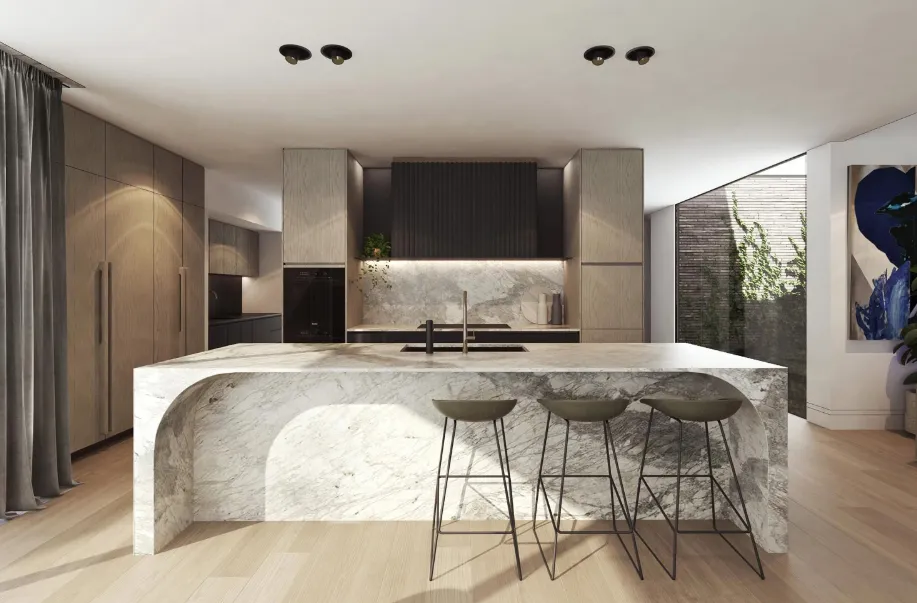 Sleek kitchen with large curved marble island, arched benchtop edge, timber cabinetry, and bar stools